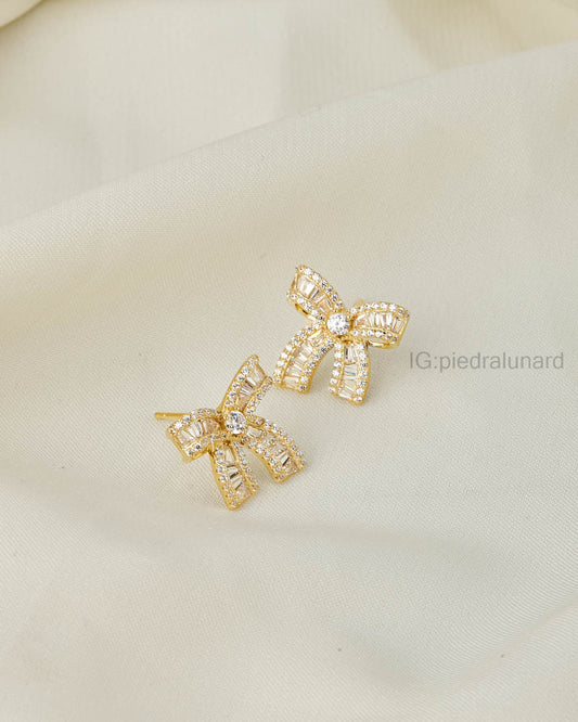 Aretes moñito dorado con circonitas A85