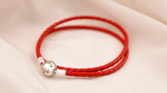 Pulsera leather roja círculo con logo PD25